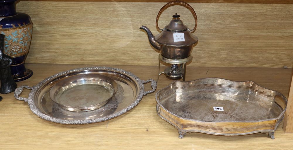 A plated kettle on spirit stand, height 35cm and two plated trays